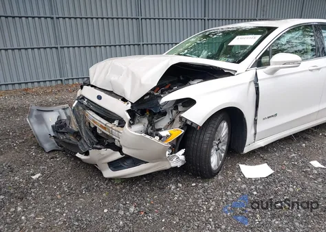 2015 Ford Fusion Hybrid Se z USA, uszkodzony, nr VIN 3FA6P0LU4FR202410